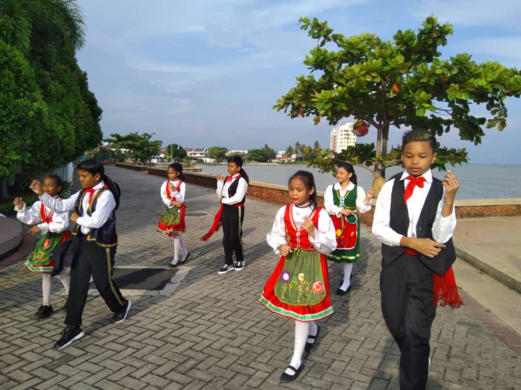 Kristang children performing a traditional dance - New Naratif