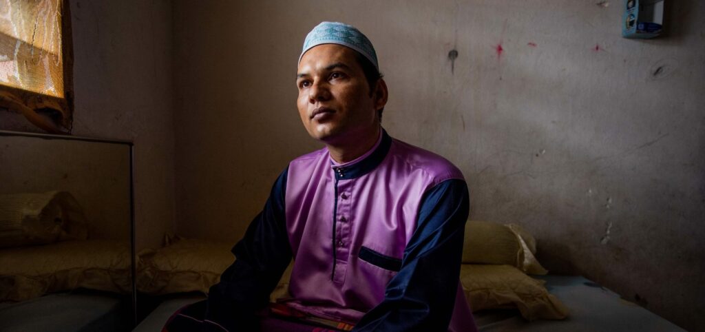 Abdul Hussin poses for a portrait at his home in Penang, Malaysia on 17 August 2018. After years of trying, his family is finally preparing to leave Malaysia for a new life in Canada.