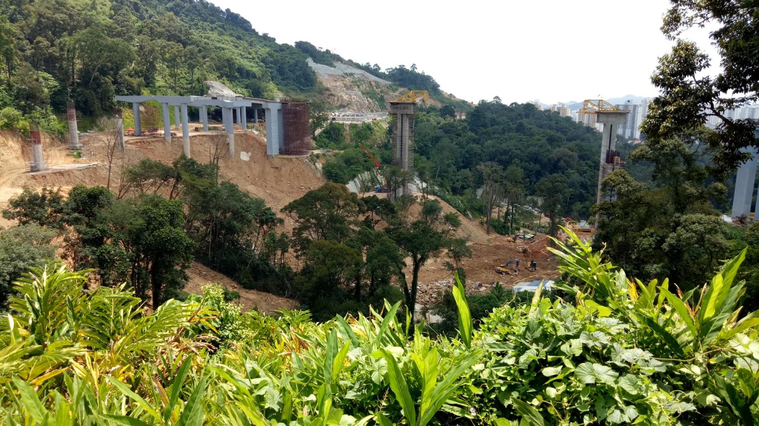 Beams of the Paya Terubong Paired Road perched on the site of the Bukit Kukus landslide in 2018 - New Naratif